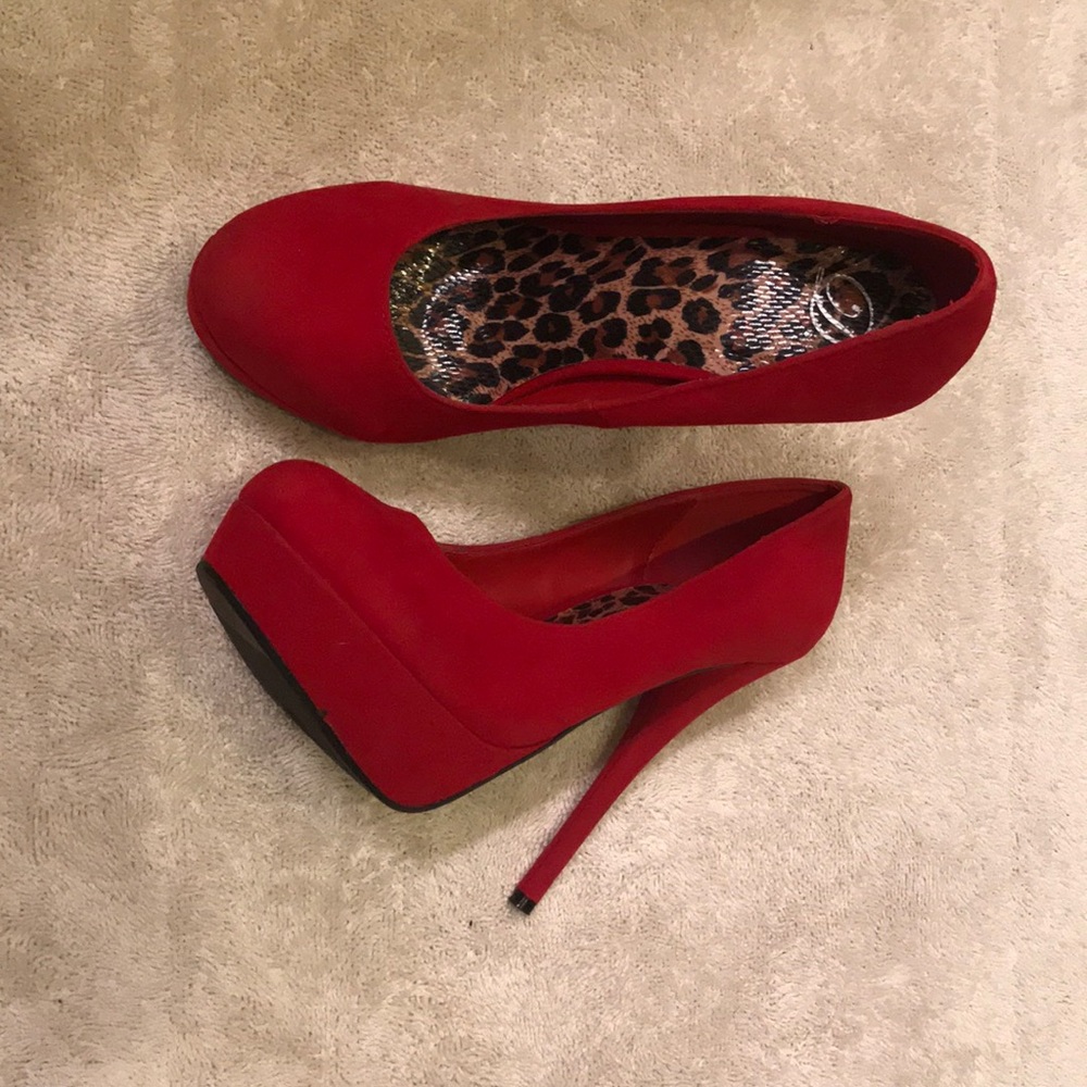 Red platform heels. Worn once.